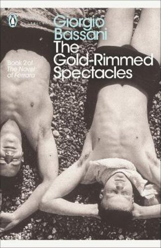 THE GOLD-RIMMED SPECTACLES