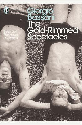 THE GOLD-RIMMED SPECTACLES